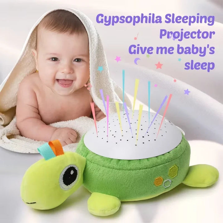 Green turtle plush projector shown with a baby and an illustrated colorful light display