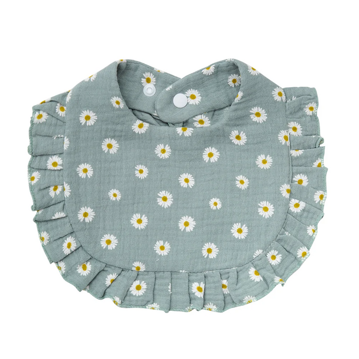 Muted green cotton baby bib with white daisies, yellow centers, and ruffled edging
