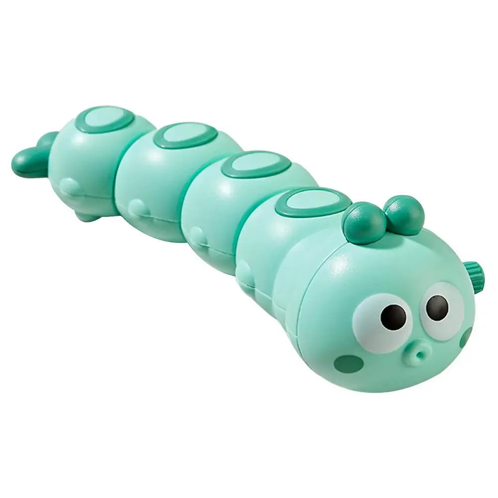 Green wind-up caterpillar toy with large eyes and darker green accents