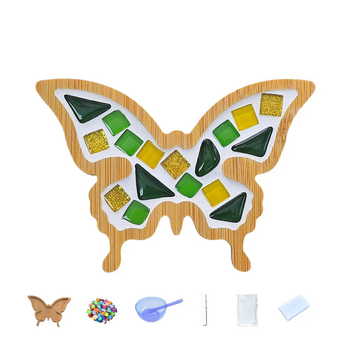Green and yellow butterfly mosaic coaster shown with bamboo base and crafting supplies