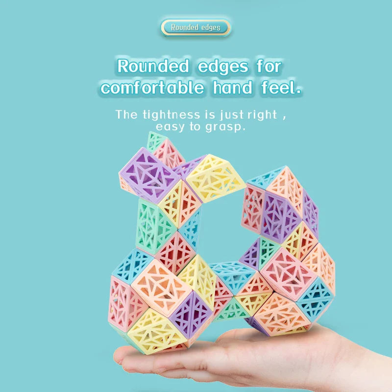 Hand holding a loop-shaped creation made from multicolored hollow pieces