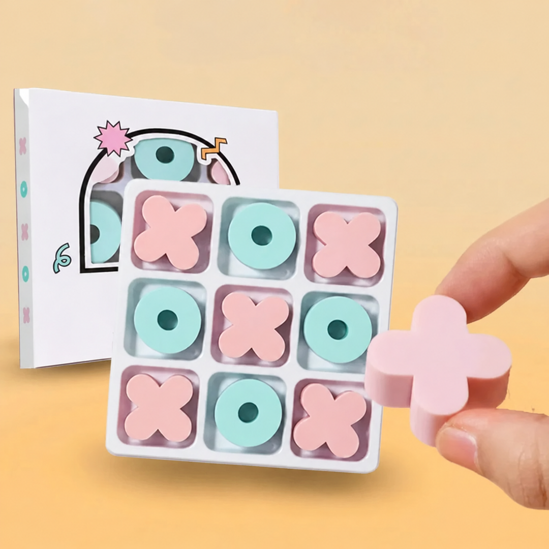Hand holding a pink X eraser beside a filled tic-tac-toe board and its box.
