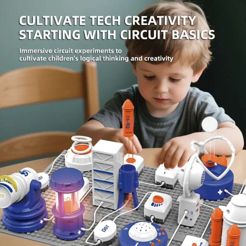 Child exploring connected electronic modules on a gray circuit building board
