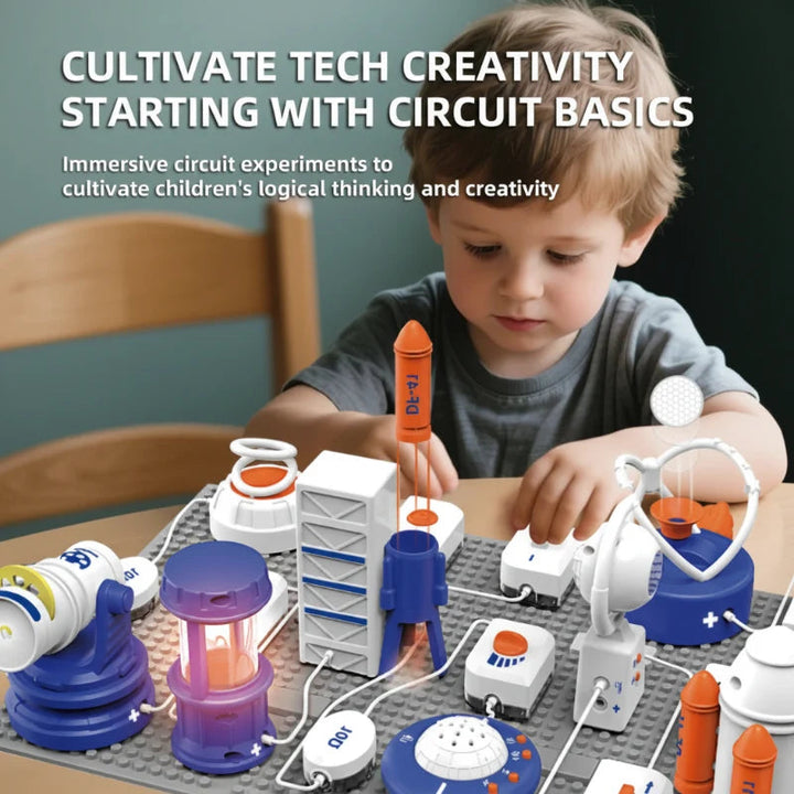 Child exploring connected electronic modules on a gray circuit building board