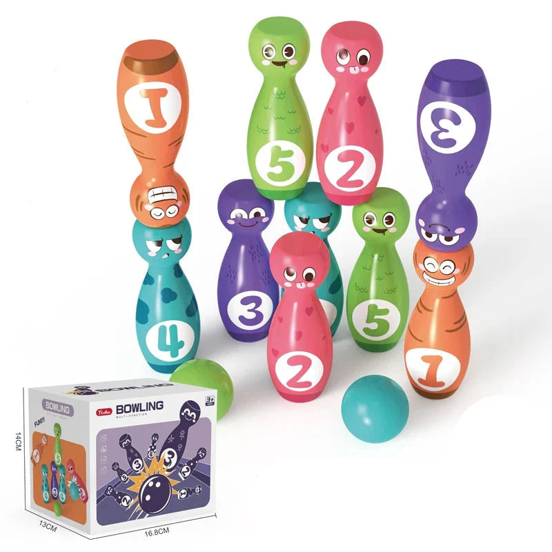 Colorful numbered bowling pins with cartoon faces, two balls, and the product box