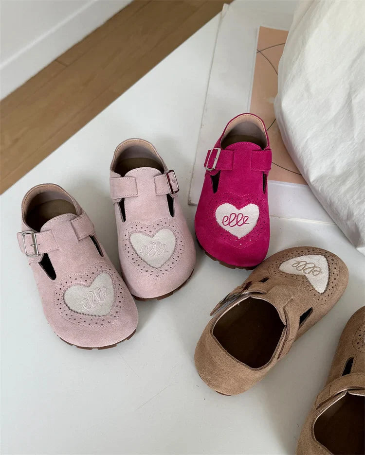 Top view of pink, red, and brown heart-detail kids&