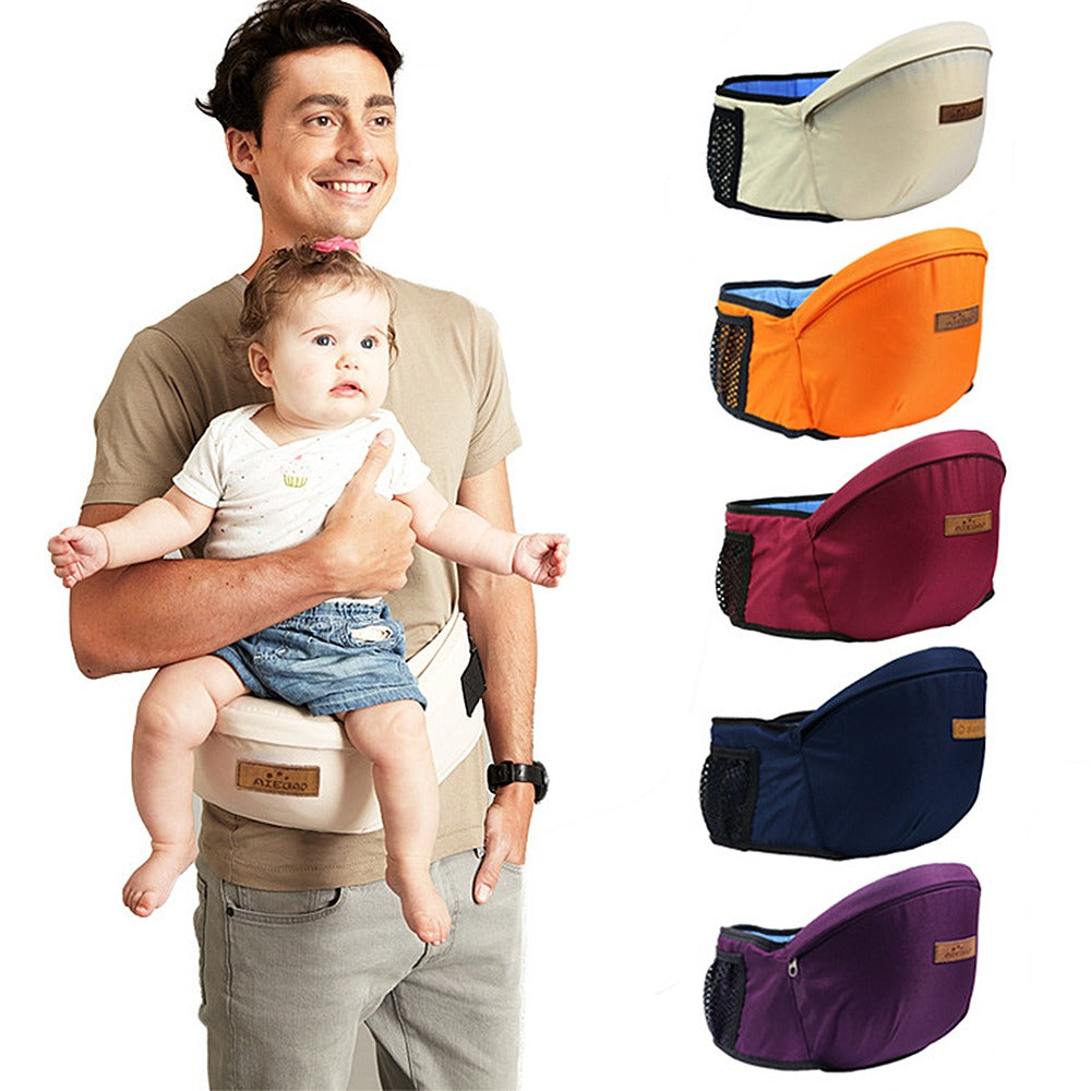 Adult holding a baby on a beige hip carry seat beside several color options