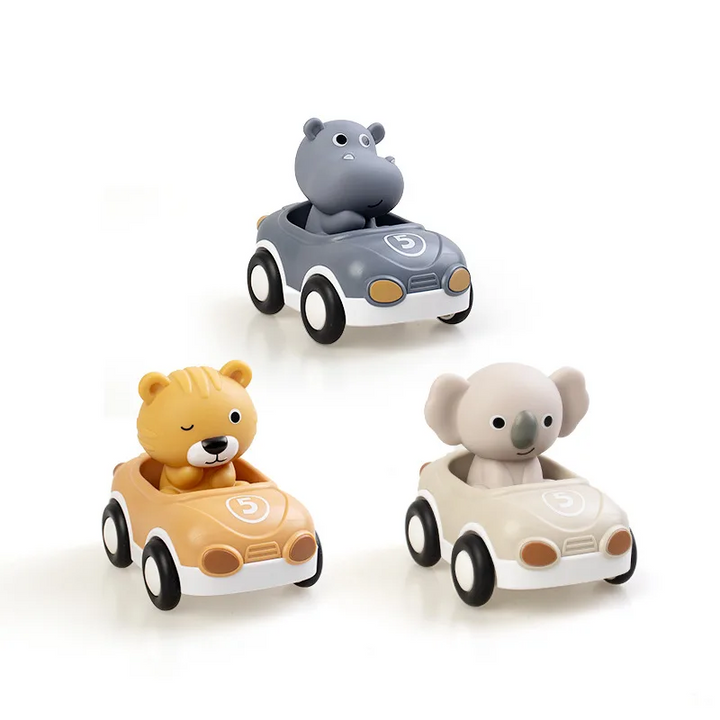 Hippopotamus, tiger and koala figures seated in three colorful toy cars