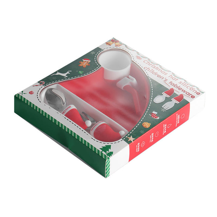 Holiday plate and matching cutlery inside a red-and-green windowed box