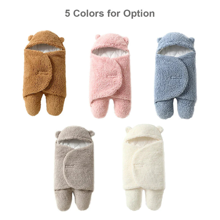 Khaki, pink, blue, gray, and white hooded baby wrap blankets shown together.