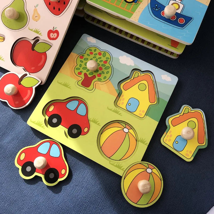 House scene peg puzzle with tree, house, car, and ball pieces, some lifted from the board