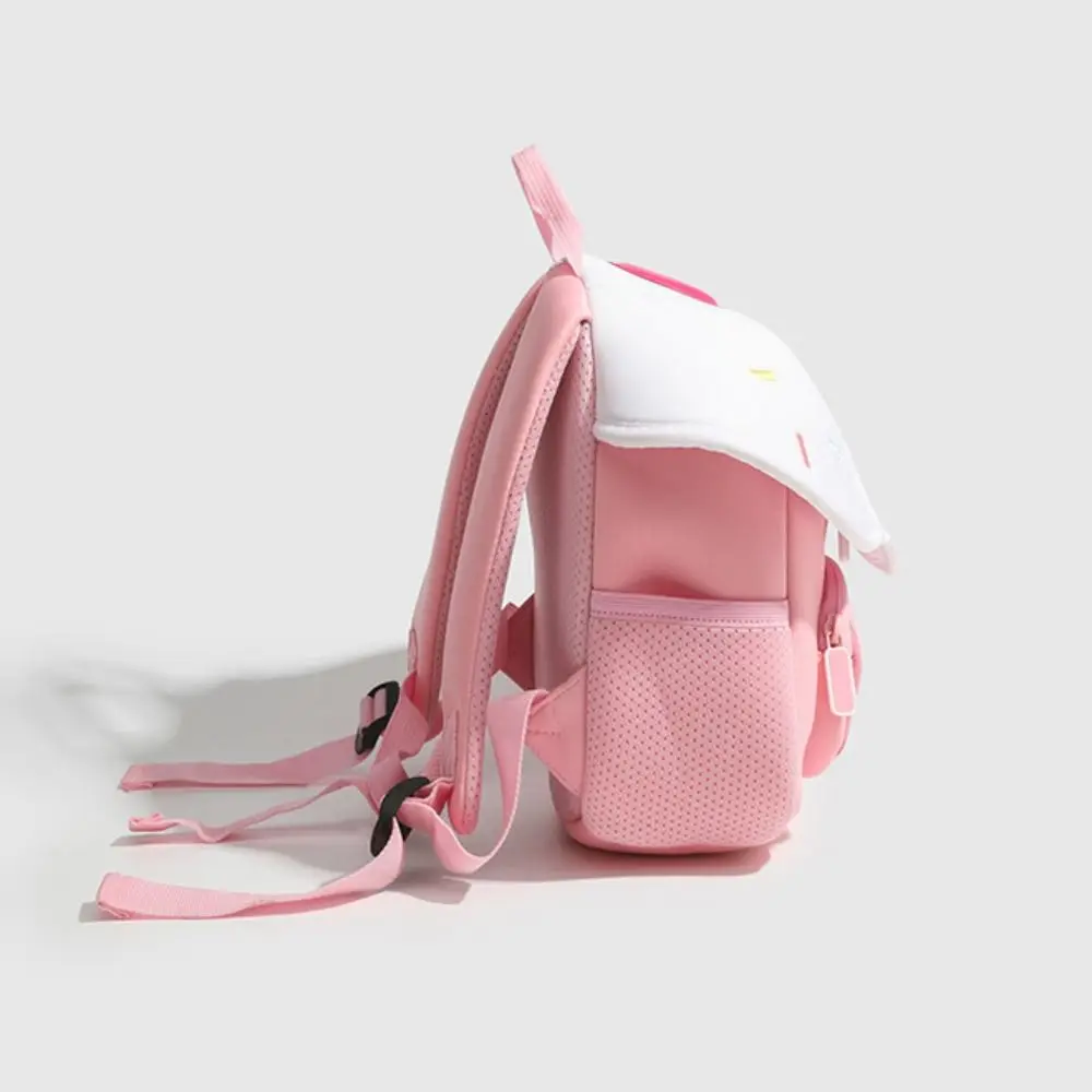 Side view of the pink Ice Cream backpack showing a mesh pocket and adjustable shoulder straps.