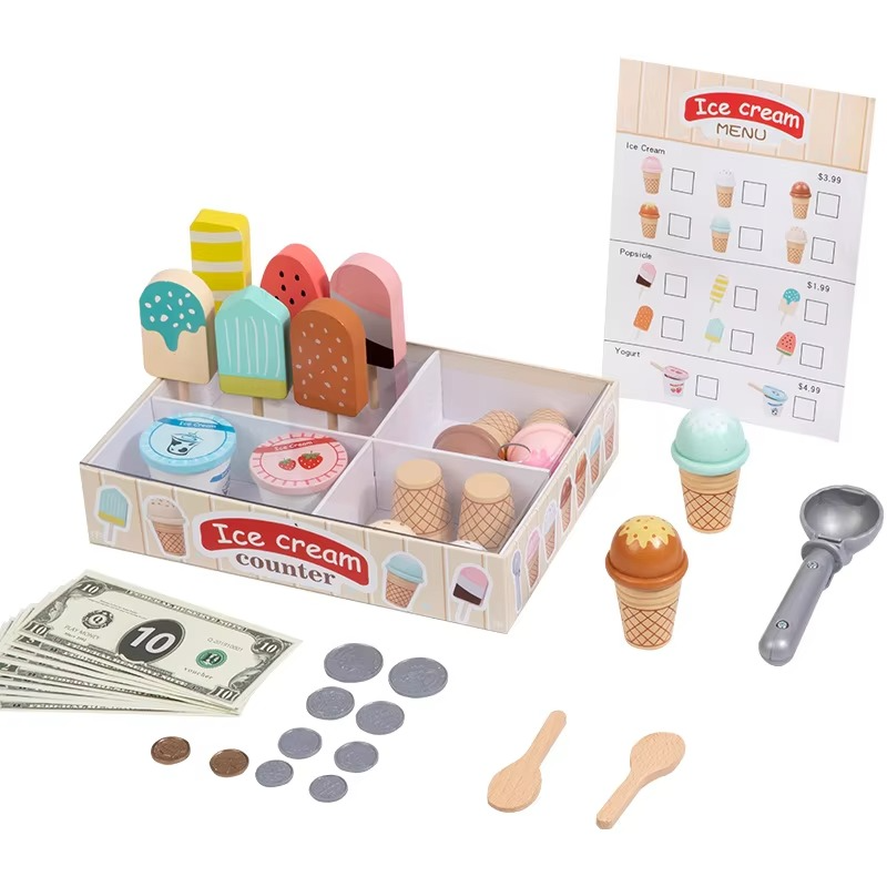 Divided ice cream serving tray with cones, popsicles, play money, spoons, a scoop, and a menu