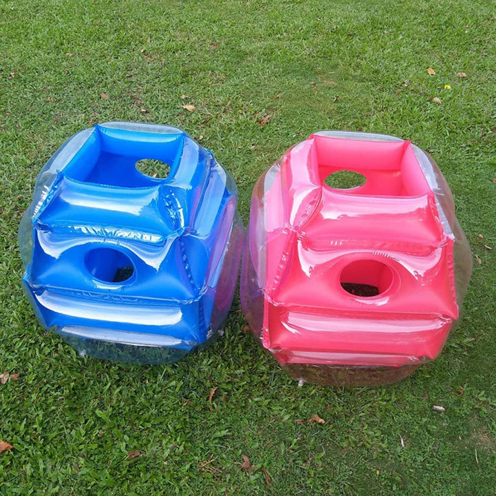 Paired blue and red inflatable play balls with open tops and round side openings