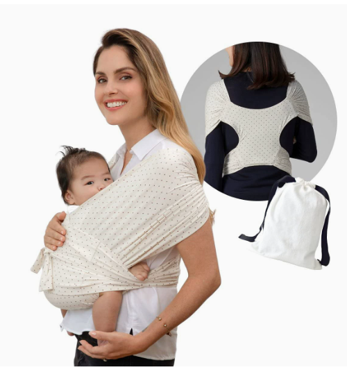 Ivory baby carrier with a small dotted pattern, shown from the front and back with a drawstring pouch