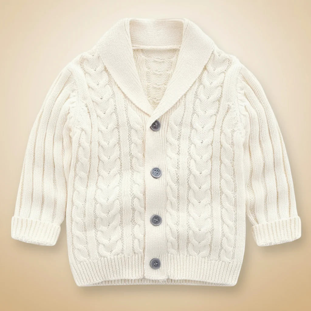 Ivory cable-knit baby cardigan with a V-neck collar and gray buttons