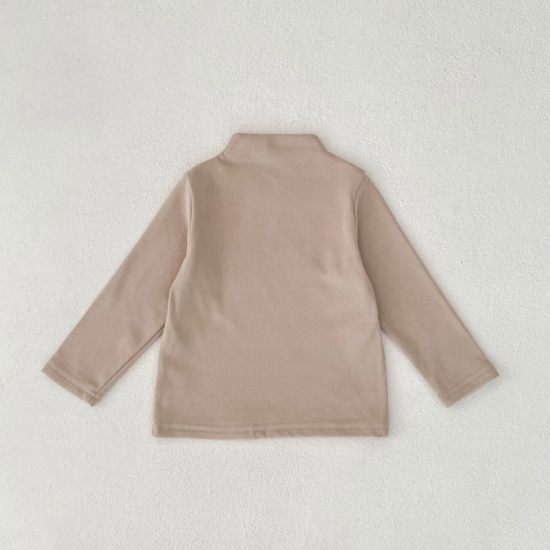 Khaki baby sweater laid flat, showing its long sleeves and straight hem.