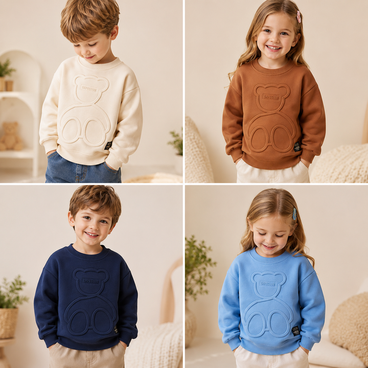 Children wearing apricot, brown, navy blue and blue sweatshirts with raised bear designs