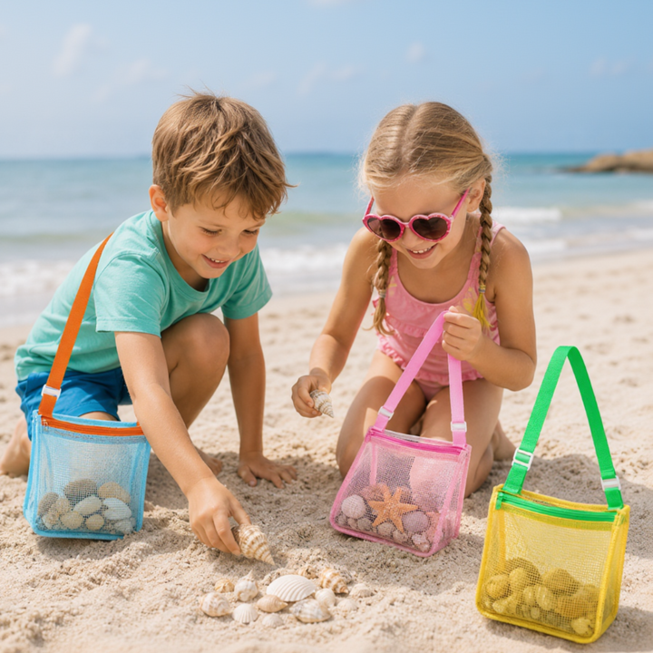 Children collecting shells with colorful mesh shoulder bags on the beach