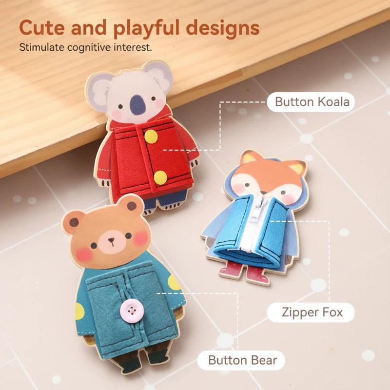 Animal dressing boards with a red koala coat, blue fox coat, and teal bear coat
