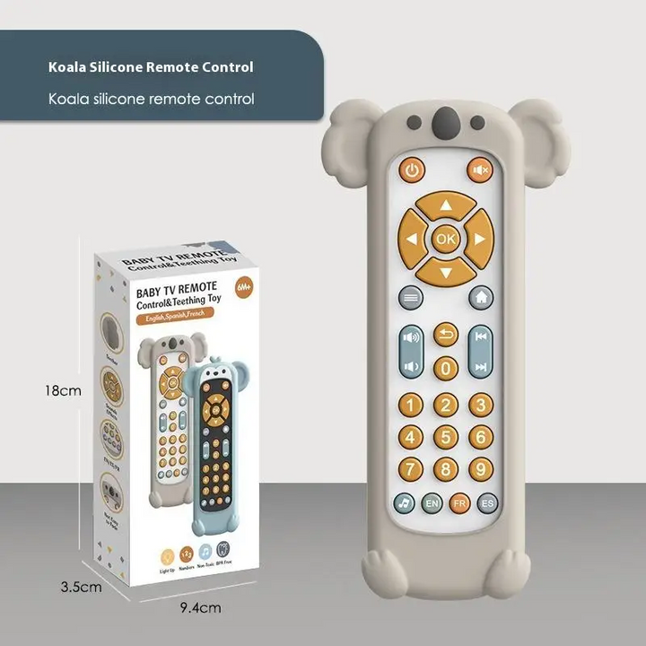 Gray koala toy remote beside its retail box