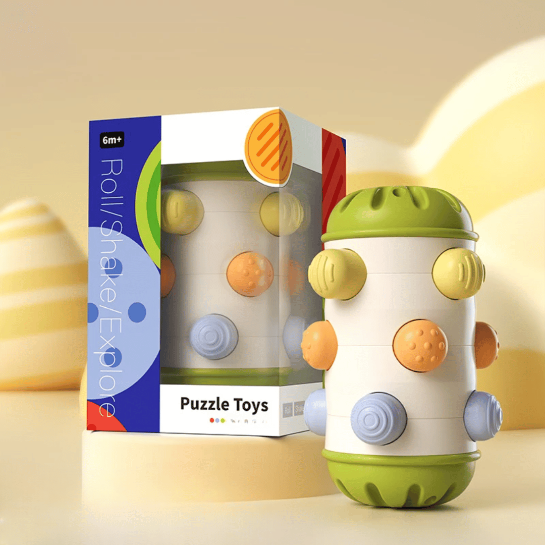 Large green-ended sensory roller with raised multicolored buttons beside its box