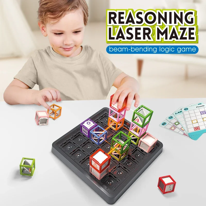 Child arranging laser maze pieces with challenge cards next to the board.