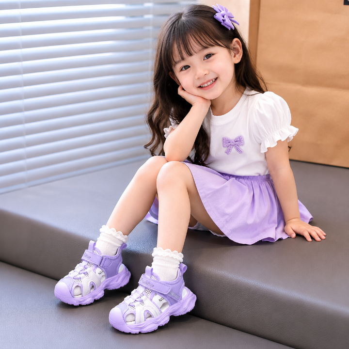 Child seated in lavender kids&