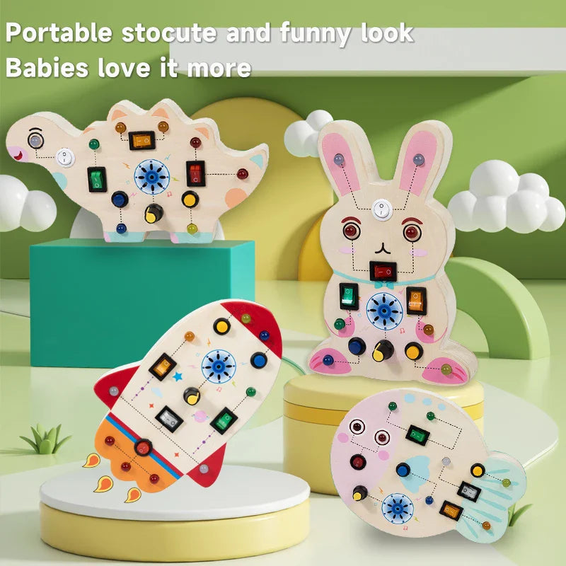 Dinosaur, rabbit, rocket, and fish LED activity boards displayed on colorful platforms