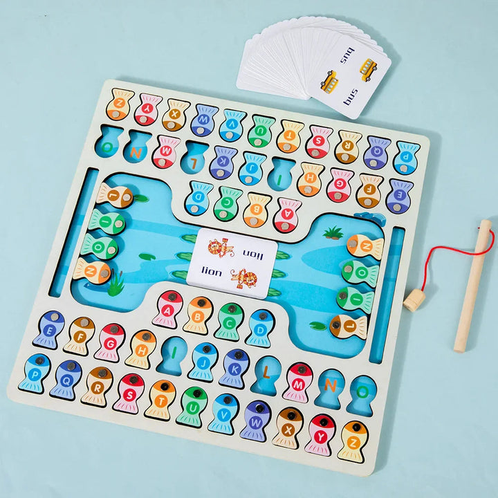 Overhead view of the wooden fishing board with lettered fish, a rod, and picture cards