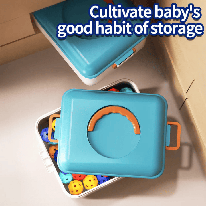 White storage boxes with teal lids and colorful building pieces inside
