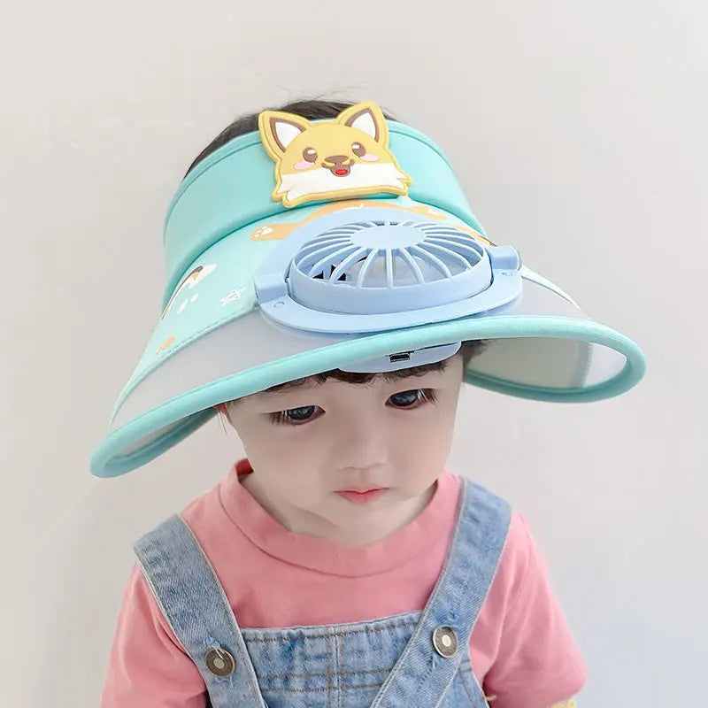 Child wearing a light blue fan hat with a cartoon dog decoration