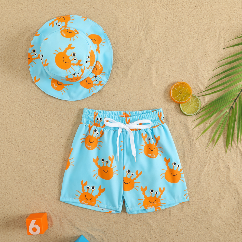 Light blue swim trunks and matching bucket hat with orange crab prints