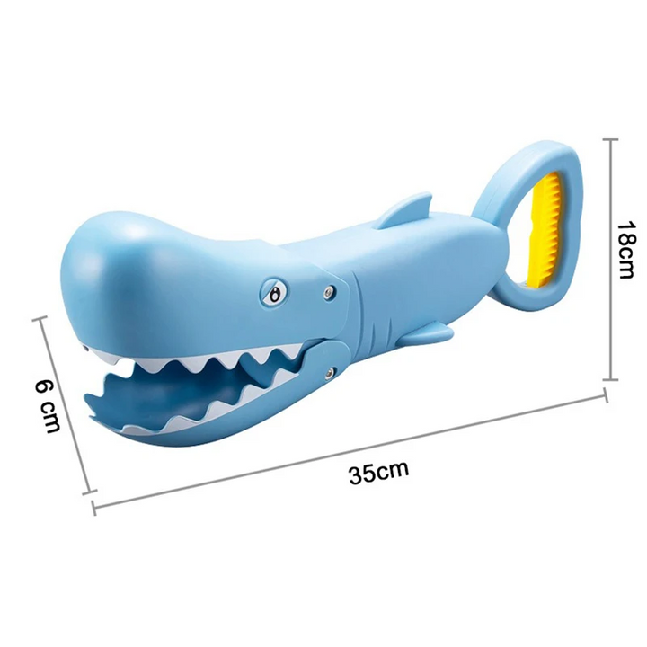Light blue shark-shaped sand grabber measuring 35 x 18 x 6 cm