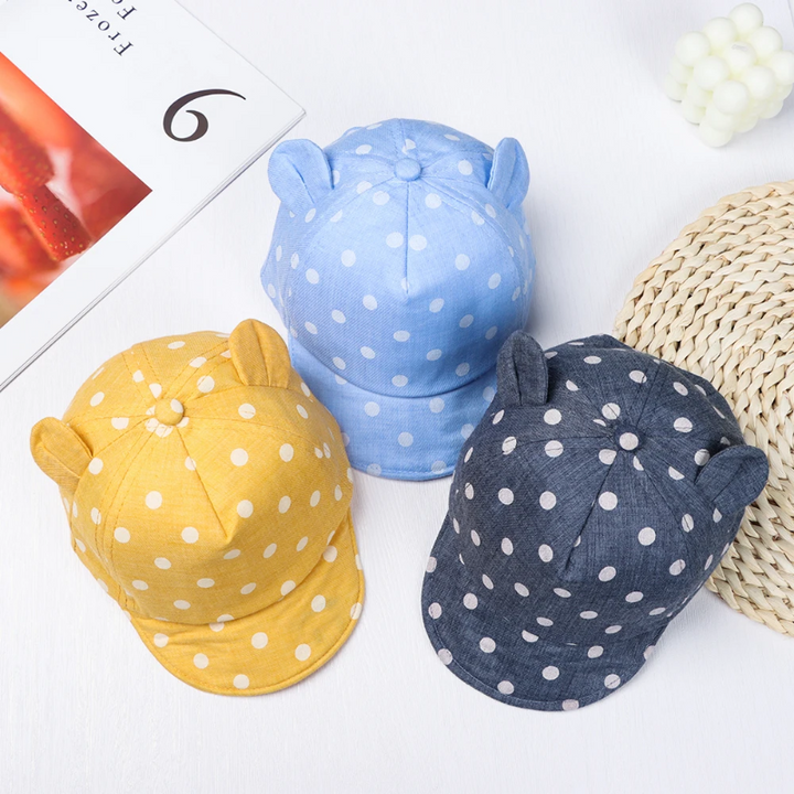 Light blue, yellow, and navy polka dot kids&