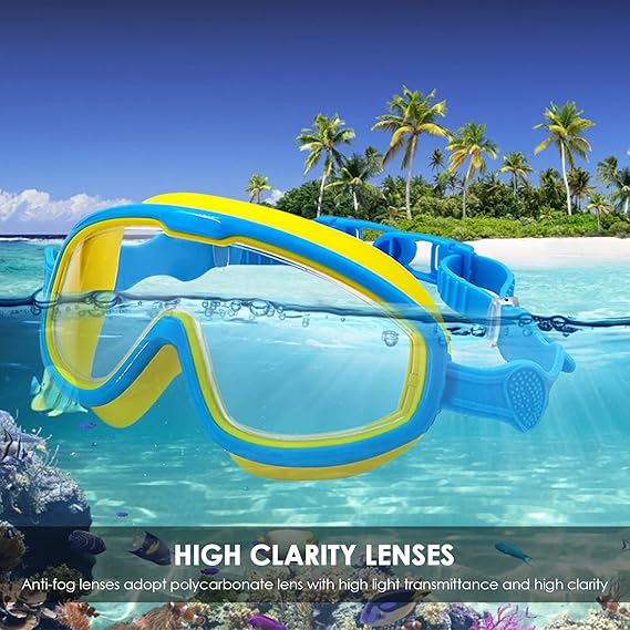 Light blue and yellow swimming goggles shown at the waterline beside a tropical beach