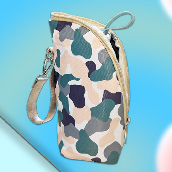 Light camouflage zippered bottle-warmer pouch with wrist strap.