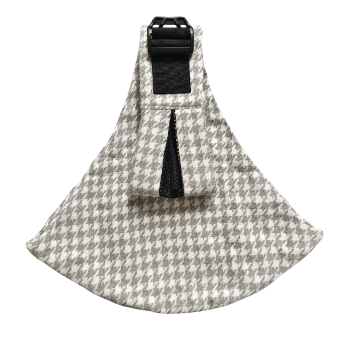 Light gray and white houndstooth hip carrier with a black buckle
