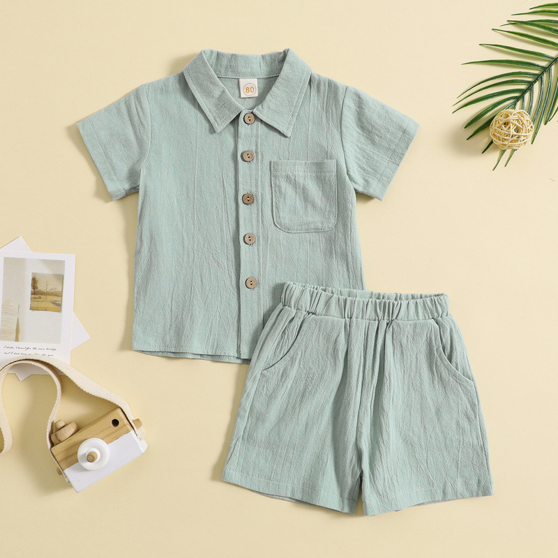 Light green collared cotton shirt with short sleeves and matching elastic-waist shorts
