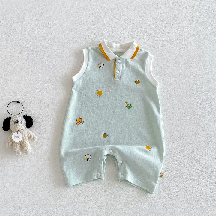 Light green sleeveless baby polo romper with small colorful prints and a white collar with yellow trim