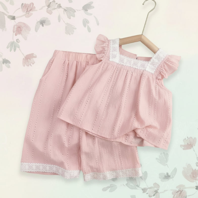 Light pink ruffle-trimmed top and matching pants with white lace accents