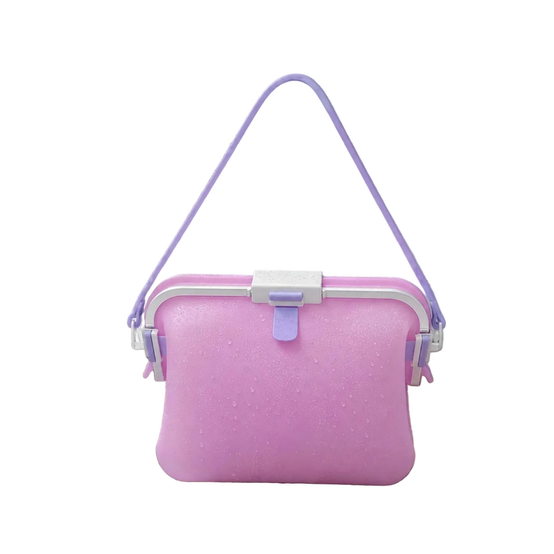 Light pink silicone shoulder bag with a lavender strap and front clasp.