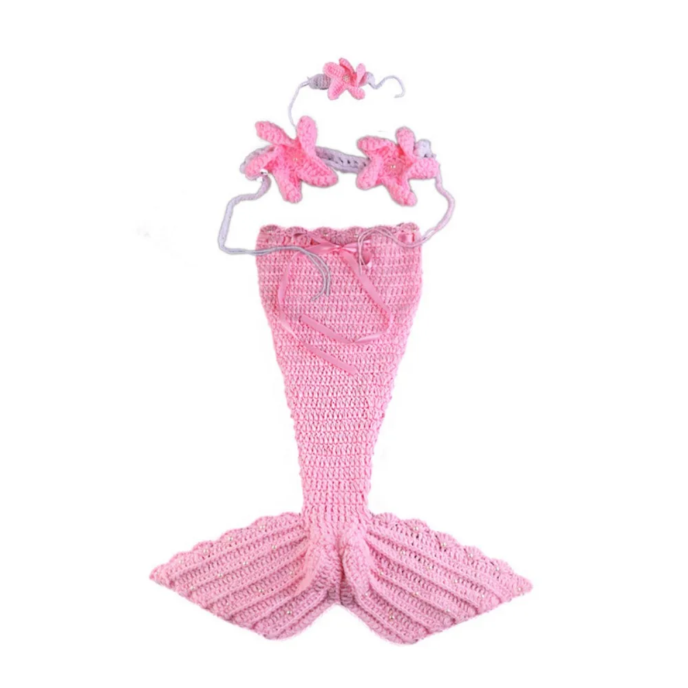 Light pink three-piece baby mermaid costume with a knitted tail, starfish top, and headband