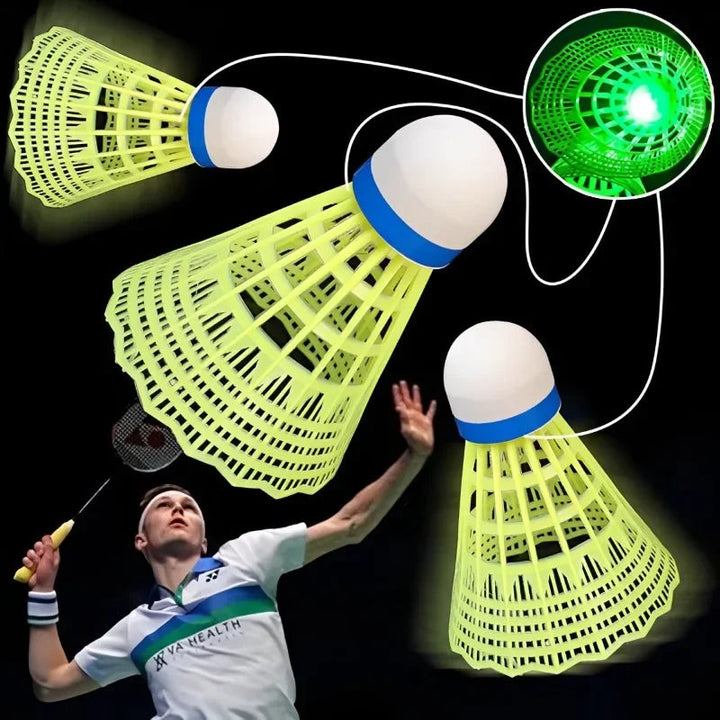 Green light-up badminton shuttles with elastic cords and a player practicing a shot