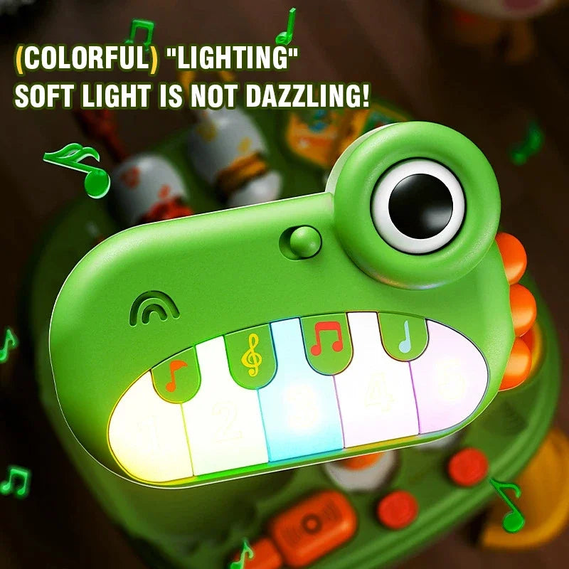 Close-up of the frog-shaped piano with glowing multicolored keys