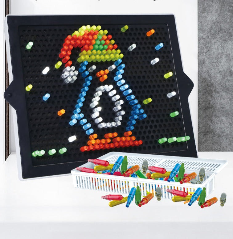Light-up peg board with a colorful penguin design and a tray of loose pegs