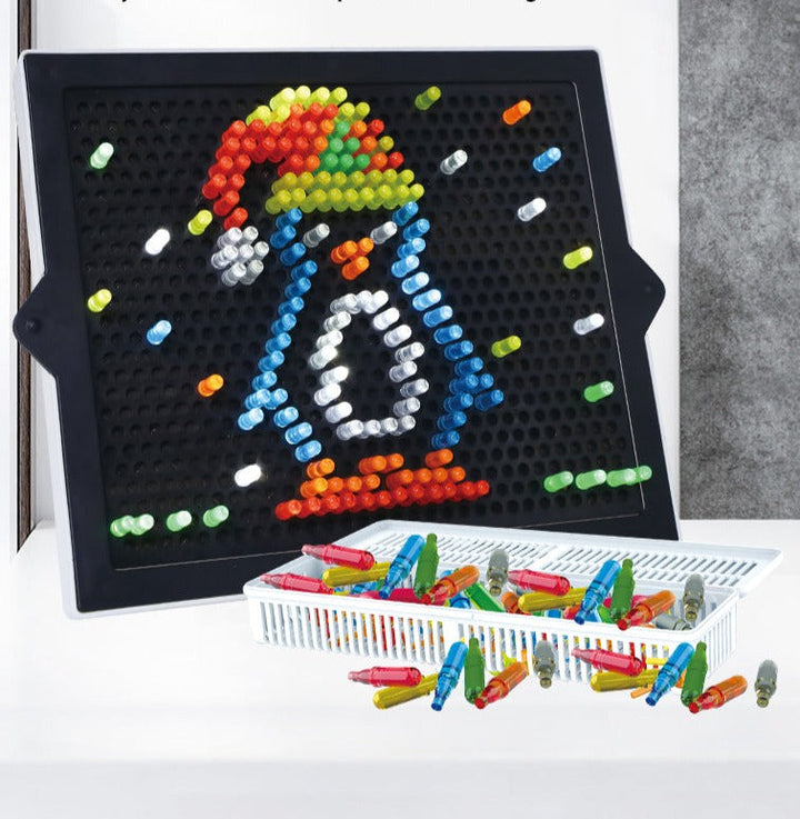 Light-up peg board with a colorful penguin design and a tray of loose pegs