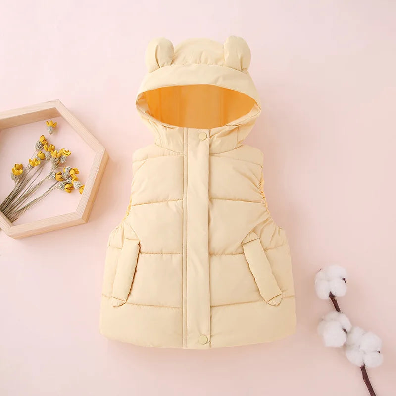 Light yellow quilted vest with an attached bear-ear hood