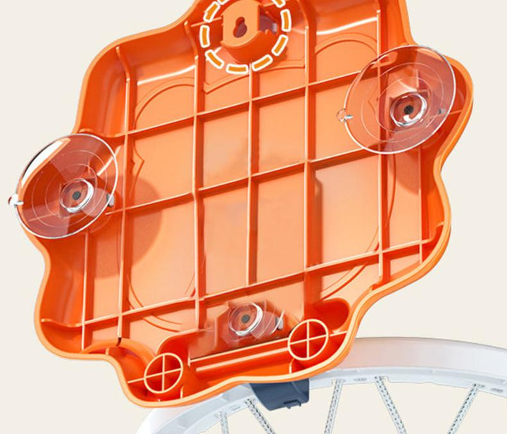 Rear of the orange lion backboard showing suction-cup mounts and the folding hoop hinge
