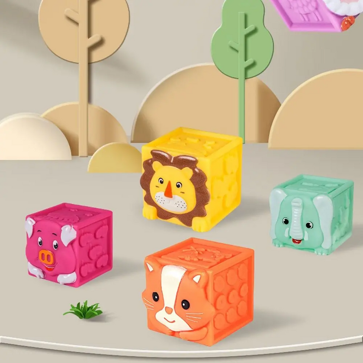 Lion, fox, pig and elephant stacking blocks on a nature-themed display